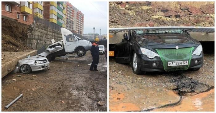В Красноярске рухнула подпорная стена дома, похоронив под собой несколько автомобилей (7 фото)